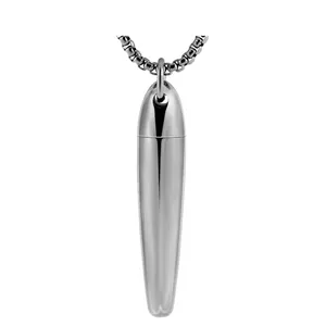 Detail view of a sleek stainless steel capsule pendant showing the polished metal finish