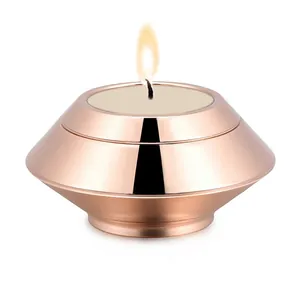 Elegant rose gold stainless steel cremation urn and candle holder for memorial ashes