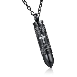 Black bullet urn necklace featuring an engraved silver cross and the Lord's Prayer.