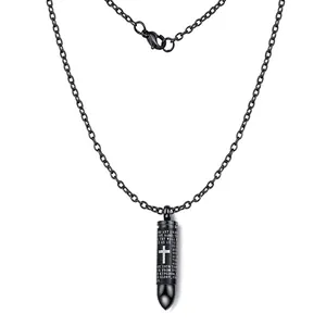 Detailed macro view of black bullet urn necklace with white cross and engraved text