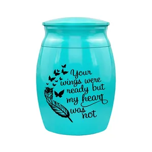 Turquoise memorial cremation urn for ashes with heart-warming quote and butterfly detail