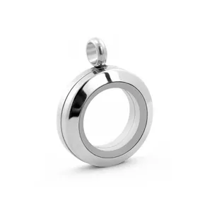 Detailed macro shot of a silver circular stainless steel floating locket pendant.