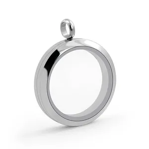 Detail view of a silver titanium steel circular locket pendant with clear glass.