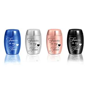 Four mini cremation urns for ashes in blue, silver, rose gold, and black colors.