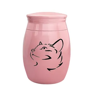 Detailansicht rosa Tierurne mit minimalistischem schwarzen Katzen-Umriss-Design auf der Oberfläche
