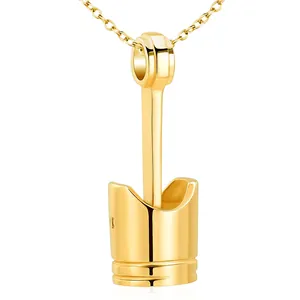 Detailed view of a gold-plated stainless steel piston urn pendant for memorial jewelry