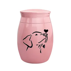 Detail der rosa Tierurne mit einem minimalistischen schwarzen Hundesilhouetten-Design
