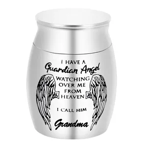 Small silver stainless steel memorial keepsake urn with engraved angel wings and text