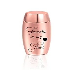 Macro detail of rose gold mini cremation urn with engraved Forever in my Heart text