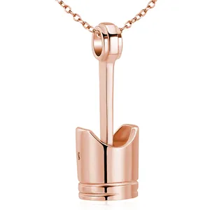 Detailed close-up of rose gold stainless steel engine piston cremation urn pendant necklace