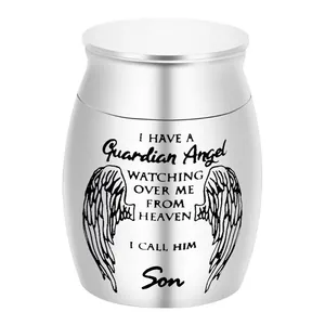 Detailed view of engraved Guardian Angel message on silver memorial cremation urn