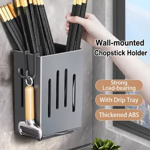 Wall-mounted kitchen chopsticks holder with drain tray and hooks for storage.