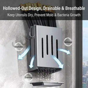 Wall-mounted grey cutlery holder with drainage tray for organized kitchen storage solution