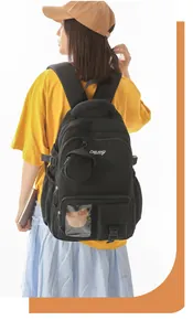 Rear view of a black Korean style backpack on a model's back