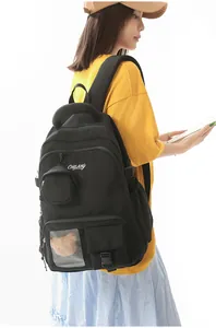 Stylish black Korean casual backpack for students featuring a cute teddy bear window