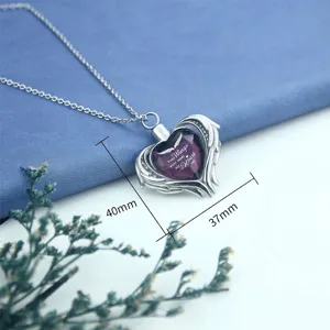 Heart-shaped cremation urn necklace with wings and purple crystal memorial pendant