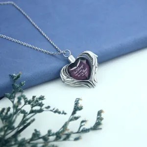 Heart-shaped angel wing memorial urn necklace with purple crystal and engraved text