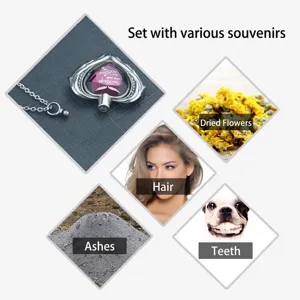 Heart-shaped cremation urn necklace for pet or human ashes with engraved heart stone.
