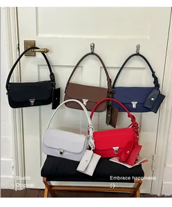 Detailed view of stylish nylon shoulder bags in five colors with matching card pouches