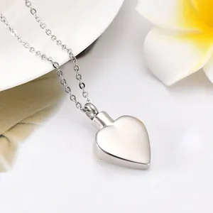 Elegant silver heart shaped cremation urn pendant necklace for ashes or perfume memorial