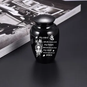 Small black aluminum cremation urn for human ashes or pet hair with memorial engraving