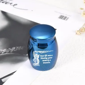 Pequeña urna conmemorativa azul de aleación con ángel grabado y cita