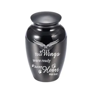 Polished black alloy pet cremation urn with angel wings and paw print heart engraving