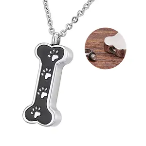 Detailed view of the screw-top opening on the bone-shaped pet urn necklace pendant