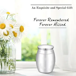 Exquisite silver aluminum memorial urn for pet ashes displayed on a sunny windowsill