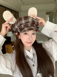 Sweet brown plaid octagonal hat featuring cute plush bunny ears and bow details on top
