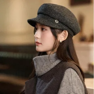 Elegant dark grey wool newsboy cap for women in vintage British style winter fashion