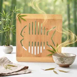 Square bamboo heat insulation mat with hollow fish bone design for table protection