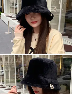 Macro detail of high-quality black plush bucket hat worn by model in urban setting