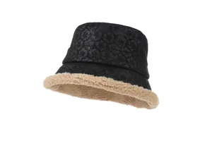 Detailed view of vintage jacquard suede bucket hat with cozy beige faux shearling lining