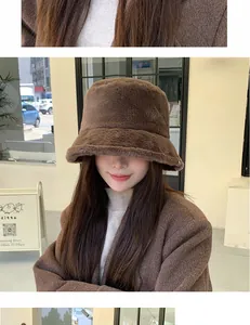 Close-up of a stylish brown plush bucket hat worn by a model in a winter setting