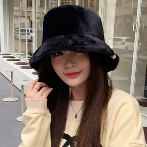 Elegant black plush bucket hat for women, stylish and thick warm winter fashion accessory
