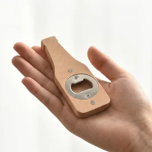 Ergonomic beech wood beer bottle opener with magnetic fridge sticker, handheld view