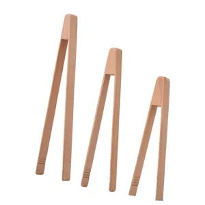 Set of three eco-friendly beech wood kitchen tongs in various sizes for baking and salad