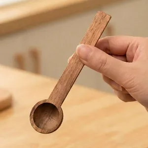 Handcrafted acacia wood mini round spoon for coffee, honey, jam, and seasoning use