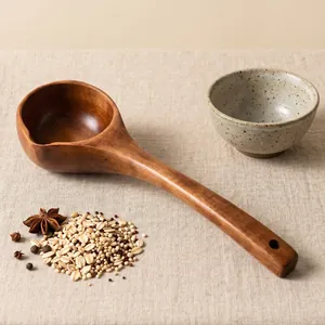 Handcrafted 31cm long-handled wooden soup ladle for rustic kitchen and dining use