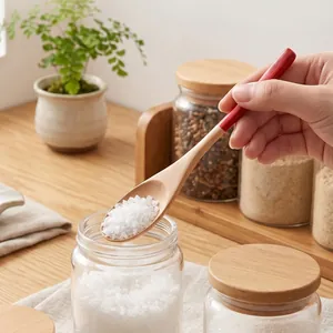 Minimalist natural wooden seasoning spoon with red handle tip for salt scoop