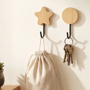 Decorative star and round bamboo wall hooks with black metal hangers for home organization