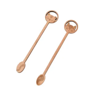 Handmade beech wood coffee stirrers featuring cartoon tiger and fox designs on long handles