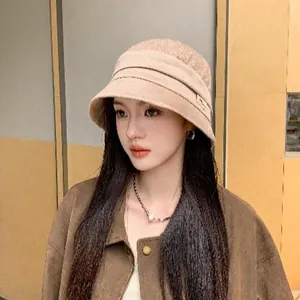 Elegant Korean style wide brim bucket hat for autumn and winter fashion styling