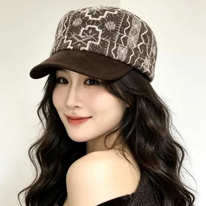 Vintage embroidered brown flat cap for women, stylish autumn winter fashion accessory.