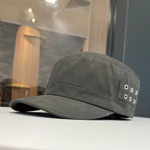 Detailed side view of a charcoal cotton flat top military cap with metal eyelets.