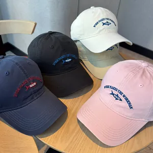Variety of washed cotton baseball caps with 'Work Makes The Workman' shark embroidery