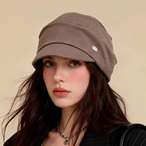Chic vintage style brown equestrian newsboy hat for women with small metal detail