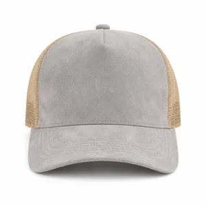 Front view of a grey suede trucker hat with breathable beige mesh panels for summer