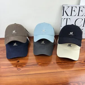 Minimalist embroidered letter baseball caps in multiple colors for sun protection